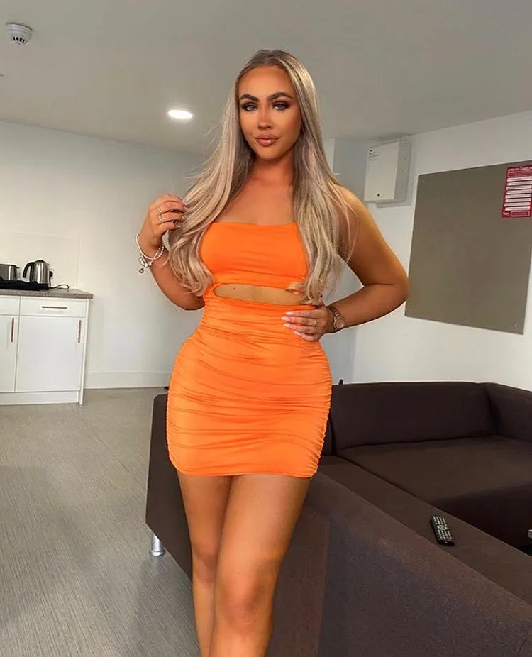 Bold One-Shoulder Cutout Bodycon Mini Dress with Pleated Detailing