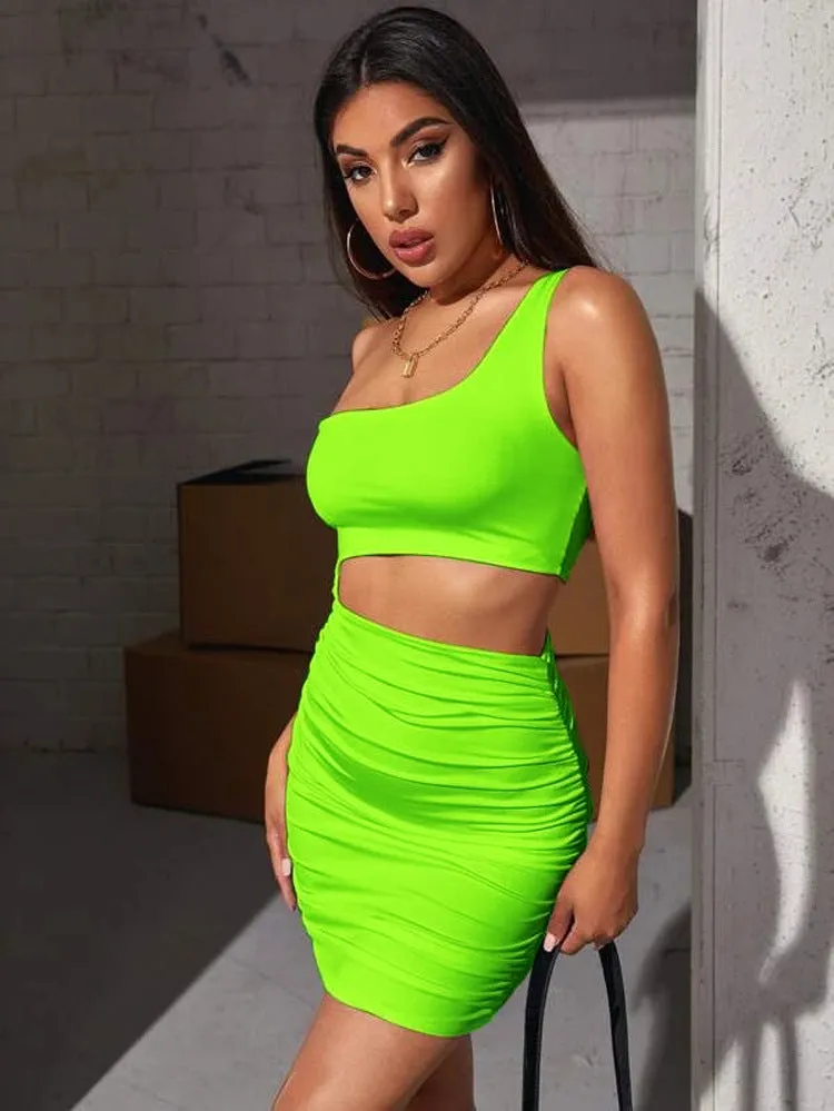 Bold One-Shoulder Cutout Bodycon Mini Dress with Pleated Detailing